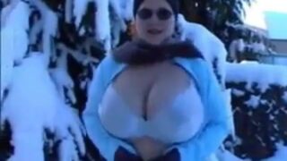 Mature with fat tits flashing in snow